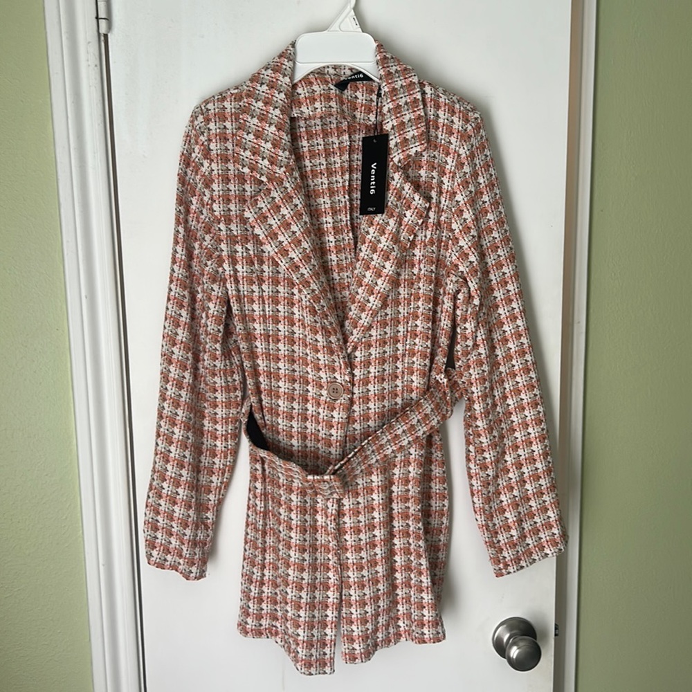 Beautiful belted blazer. Brand new with tags. Size medium
